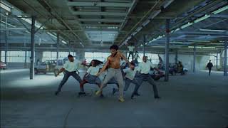 Childish Gambino doing the 'Gwara Gwara' African dance move in his new video