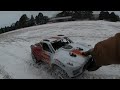 arrma mojave 4s snow bash with paddle tires.