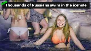 4K WHY DO RUSSIANS SWIM IN A FREEZING RIVER AT MIDNIGHT IN RUSSIA?