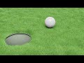 Golf ball going into hole