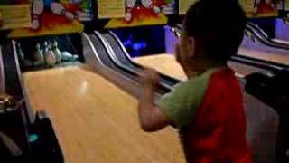 2 years old boy play bowling and get turkey