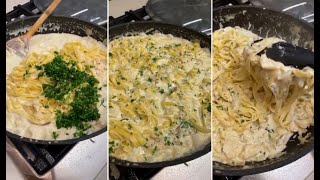 Juliana preparando um macarrão ao molho branco com bacalhau para a janta na casa da Mari