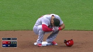 STL@MIL: Pham's RBI double hits Nelson in head