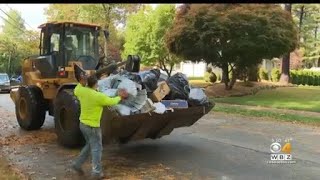 Reading DPW workers remove trash after it wasn't picked up for weeks