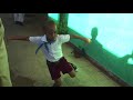 cuban boy chris dancing in his school playgroud in cuba