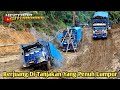 A long truck with a heavy load is determined to go through the extreme climbs of Batu Jomba