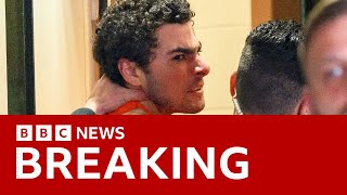 CEO shooting suspect Luigi Mangione in angry outburst as he fights New York extradition | BBC News