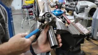 How to change a U joint or driveshaft yoke in a vise