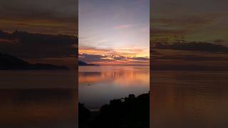 A Radiant sunset along the coastline|  #beach #beautiful #coastline #sortsvideo #viralvideo