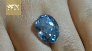 Hong Kong Auction: blue diamond shatters Asian jewelry record