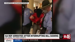 State lawmaker arrested as massive voter reform bill is signed into law