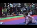 Babies Compete in a Crawling Competition (Diaper Derby) at the Smith Haven Mall