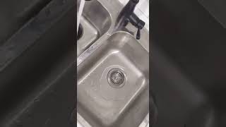 How to use a plunger to clear a kitchen sink drain blockage #diy #shorts