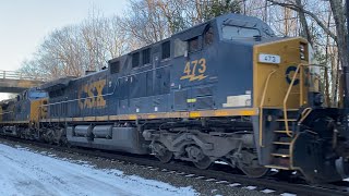 145 car M426 crawls downhill at CP56 in golden light with two YN3C locomotives