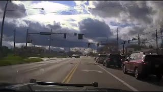 Dashcam shows close call between Brunswick police car, bicyclists