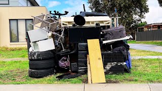 Towering Trash Piles In Challenging Conditions
