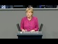 Merkel defends arming Kurdish fighters in Iraq