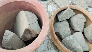 CEMENT CHUNKS FULL DRY CRUMBLING IN CLAY POT