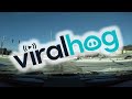 Car in a Hurry Slides Haphazardly Through Intersection || ViralHog