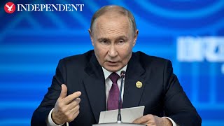 Putin delivers keynote speech at the Valdai forum as UK announces 56 new Russian sanctions