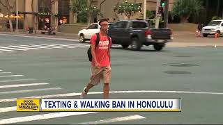 Honolulu passes law that makes texting while crossing the street illegal