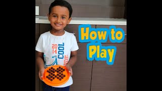 4 year kid playing BRAINVITA || Solving marble solitaire || BRAINVITA game rules