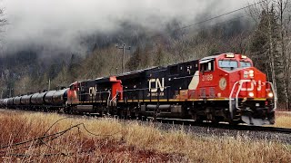 Long CN Mixed Freight Train Working Thru Foggy Mountains On CP’s Cascade Subdivision