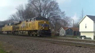 UP 8263 leads EB stack/trailer with mid-train DPUs