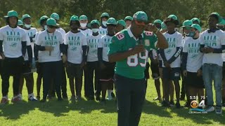 Miami Dolphins Legend Nat Moore Visits Miami Palmetto Senior High School; School Receives Football E