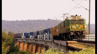 INDIAN RAILWAYS Dara viaduct crossing by a WAG9 TKD power led container train.MP4