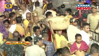 Servitors Carry The Sacred Prasad, Offered To The Holy Deities, With Deep Devotion