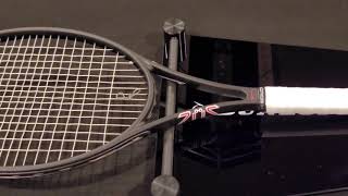 Demonstration of Dunlop Balance Board for tennis racquets.