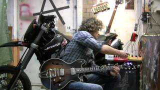 Alex Gavril Aka Oaie testing a Maton BB-1200 guitar