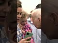 Joe Biden nibbling on frightened young girl