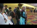 playing the melodica while following random cosplayers