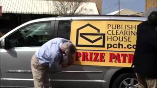 The Prize Patrol Puts on the Van Sign!