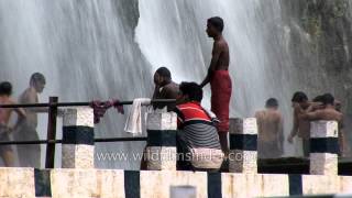 Man bathing in Thiruparappu Waterfall - Kanyakumari