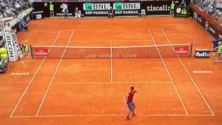 Il raccattapalle e Federer al Foro Italico