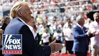 'USA! USA! USA!': Trump receives 'hero's welcome' at Formula 1 Miami Grand Prix
