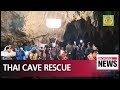 12 boys and football coach free from flooded Thai cave