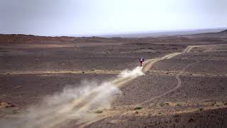 Toby Price being chased by a helicopter