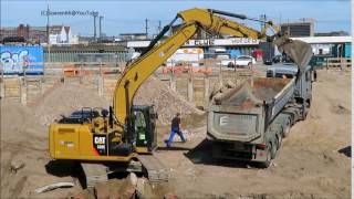 Soeren66 - Bagger CATERPILLAR 320E belädt Laster in Baugrube