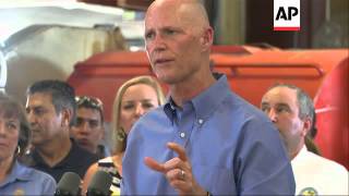 Bush lends his political star power to embattled Florida Gov. Rick Scott, ho is locked in a tight ra