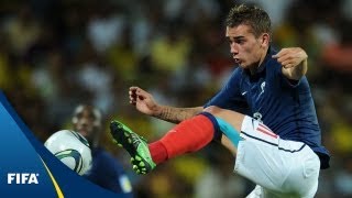 Controversial goal sends France through