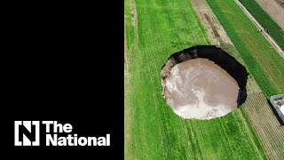 Huge sinkhole cracks open farmland in Mexico