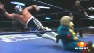 Mexican Wrestler Dropkicks Midget in a Monkey suit