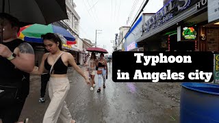 Typhoon in Angeles city. Wet Walk in Fields avenue and Walking Street.