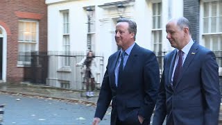 Ex UK PM David Cameron leaves 10 Downing St after being appointed foreign secretary | AFP