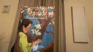 Ms. Bonaparte reads “Molly’s Bracelet” by Isabel Bissett