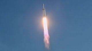 SpaceX Falcon Heavy launches Tesla into orbit